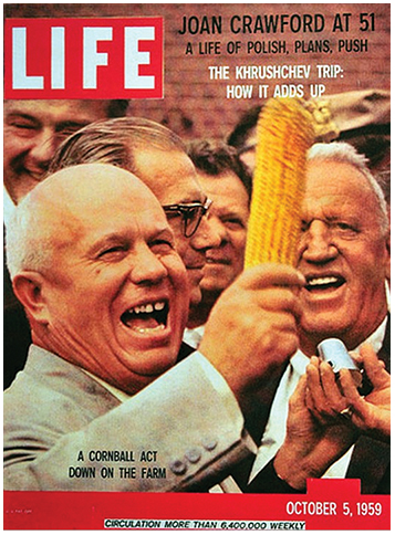 Soviet Premier Nikita Khrushchev enthusiastically holds up corn at the Garst Family Farm in Coon Rapids, Iowa. Life magazine, October 5, 1959.